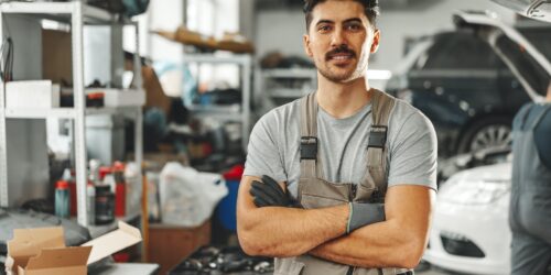 Portrait of a male mechanic in an auto repair shop